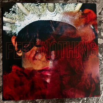 FEEL NOTHING / PARADIGM - TRANSLUCENT ORANGE 7” VINYL